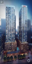 Building Photo - 8-4818 Widmer St