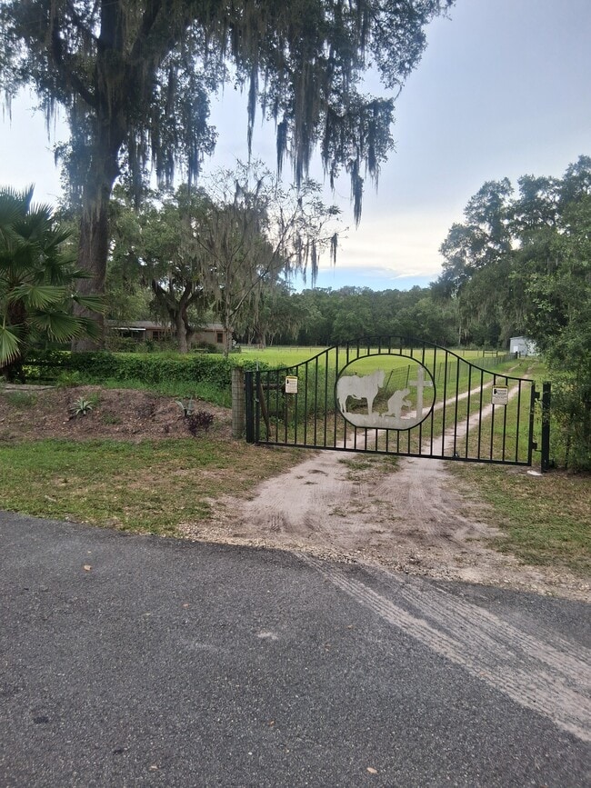 Driveway, electric gate - 11900 SW 121st Ave