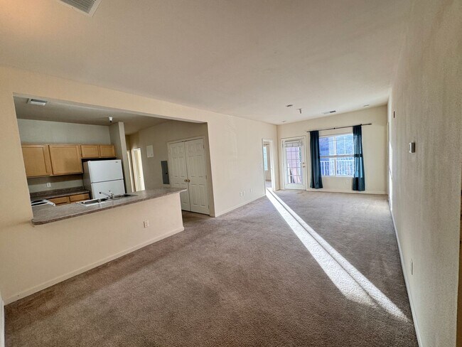 Building Photo - Home Near UNR: Spacious 4BR/4BA with Gated Access and Balcony!