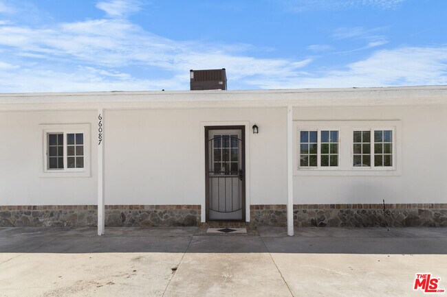 Building Photo - 66087 Desert View Ave