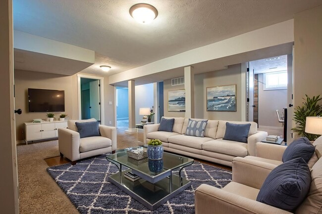 Building Photo - Adorable Brick 4 Bedroom Ranch with Finish...