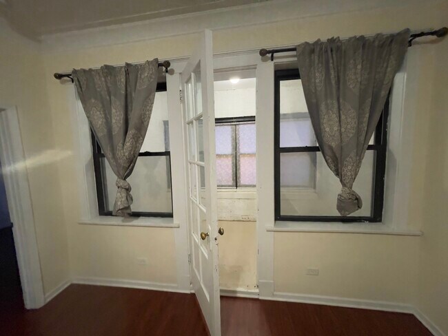 Enclosed Balcony - 3235 S Halsted St