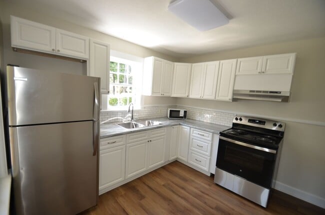 Building Photo - Charming 2-Bedroom, 2-Bath Single-Family Home with Sunroom & Wooded Views