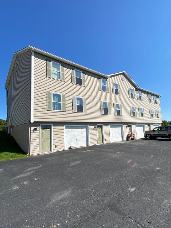 Unidades 9-12 de las casas adosadas Meadowview - 204 Betsinger Rd