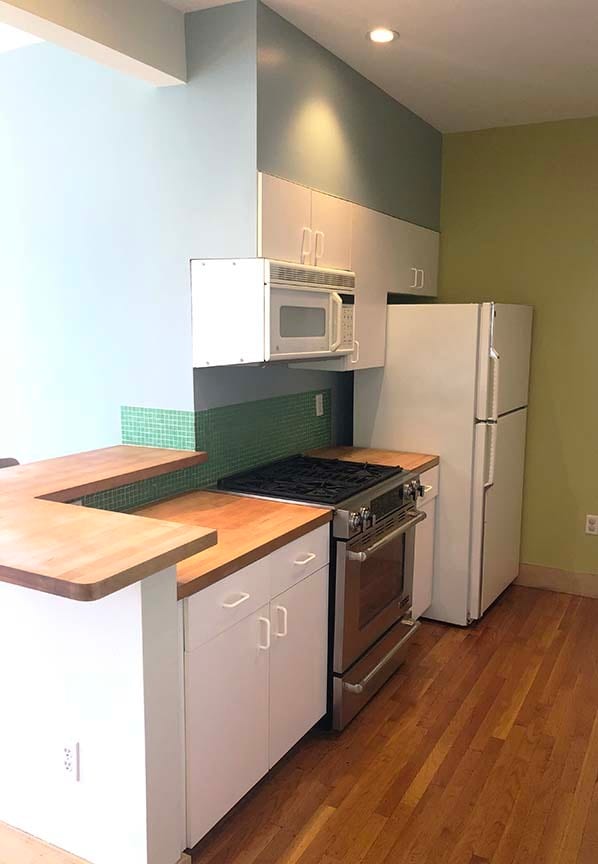 Kitchen showing range - 96 Broadway
