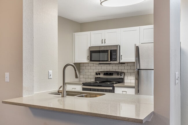 Experience upgraded Lux apartments today! Stainless steel appliances, shaker cabinets, and more! - Village Green Student Housing Apartments