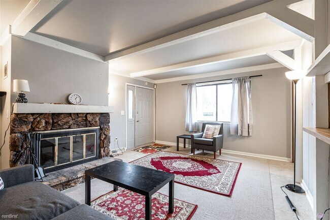Building Photo - 2 br, 1.5 bath Condo - 6956 North Raintree...