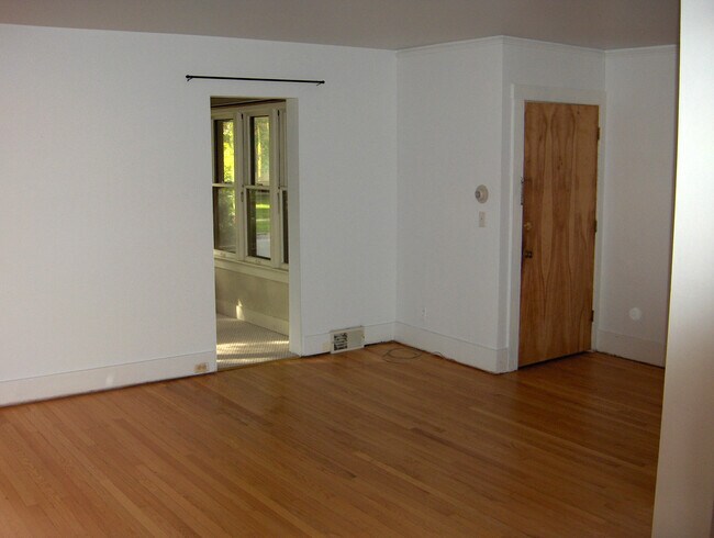 Entrance, sunroom, living room - 1115 Granger Ave