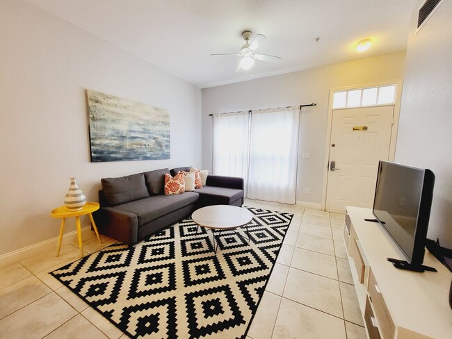 Building Photo - Perfectly located and fully furnished town...