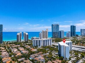 Building Photo - 19380 Collins Ave