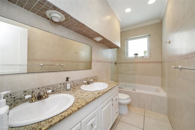 Foto del edificio - 4 br, 3 bath House - 1250 101st St