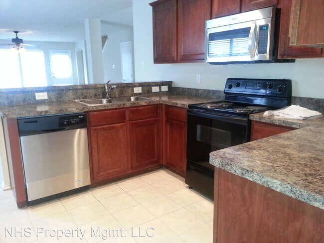Building Photo - 4 br, 2.5 bath House - 10417 Hideaway Trail