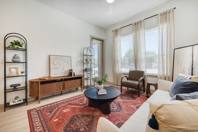 Spacious living room with an open layout and plenty of room to make it your own at Mesquite Trails a - Mesquite Trails at Brooks - A 55+ Community