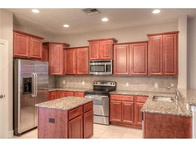 Building Photo - 16006 Bella Woods Dr