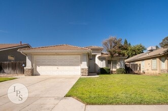 Building Photo - 5532 W Minarets Ave