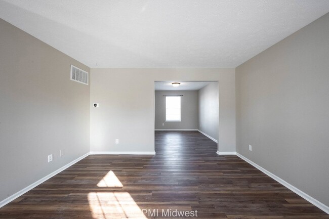 Building Photo - "Spacious 4-Bedroom Gem with Finished Base...