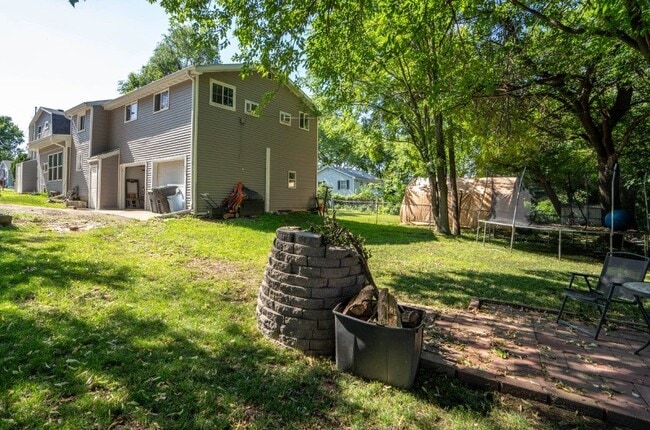 Building Photo - Spacious 4-Bedroom Multiplex Rental with 2...