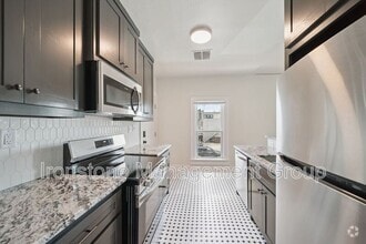 Building Photo - 1437 S Peoria Ave
