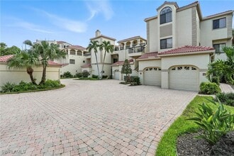 Building Photo - 7032 Pelican Bay Blvd