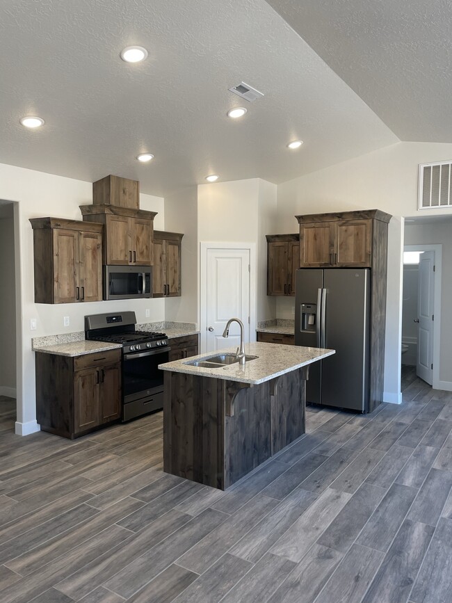 Kitchen with granite countertops - 4406 W 275 N