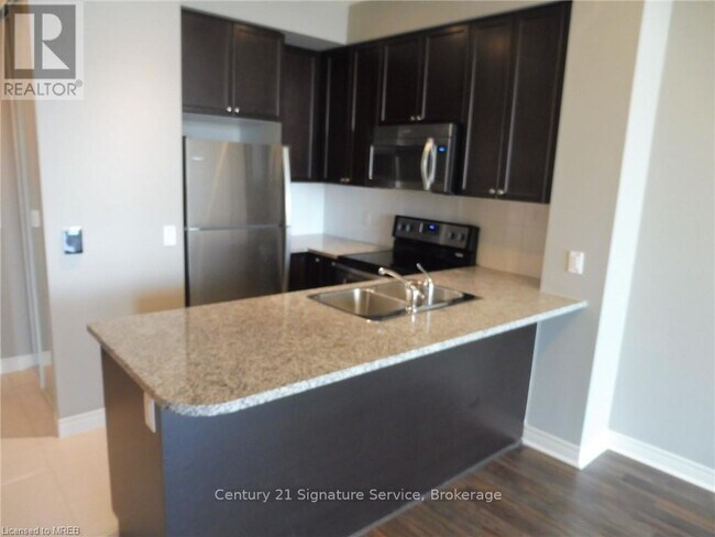 Photo du bâtiment - 339 Rathburn Rd W