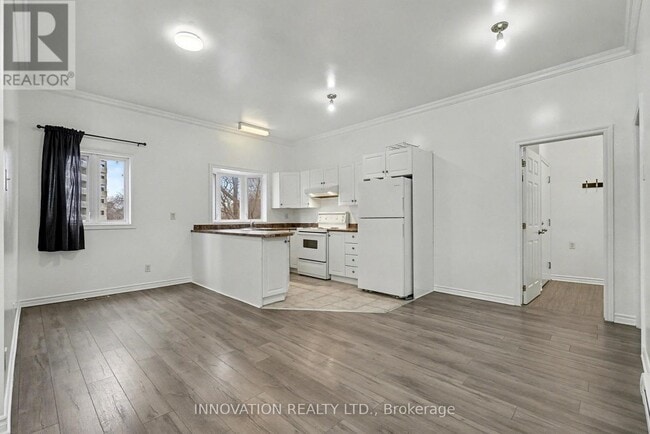 Building Photo - 64 Genest St