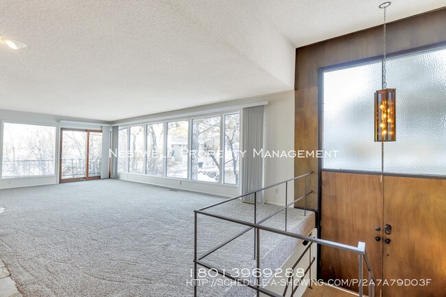 Building Photo - Coveted Olympus Cove Location
