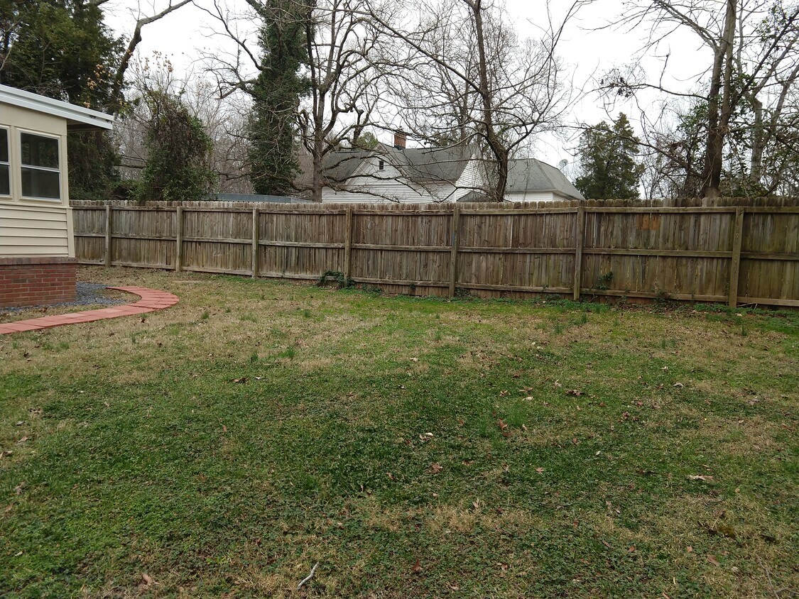 Home has privacy fence around 3 sides with access to walking trails - 4800 Matthews-Mint Hill Rd