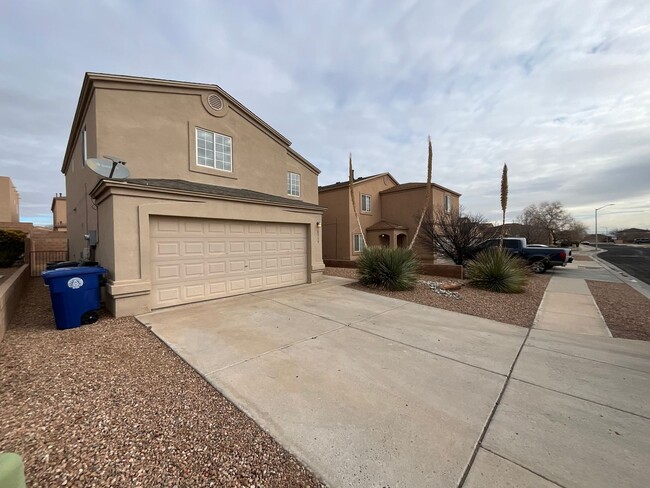 Building Photo - 3 Bedroom Home Available Near Unser Blvd S...