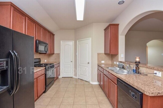 Foto del edificio - 11206 Barker Park Ct