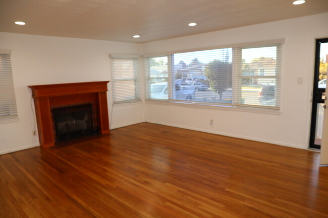 Living Room with decorative fireplace - 12074 Juniette St
