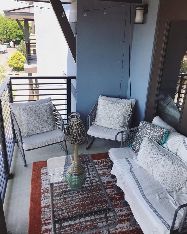 Porch with city views, other side of porch has room for a bistro set - 2401 Euclid Ave