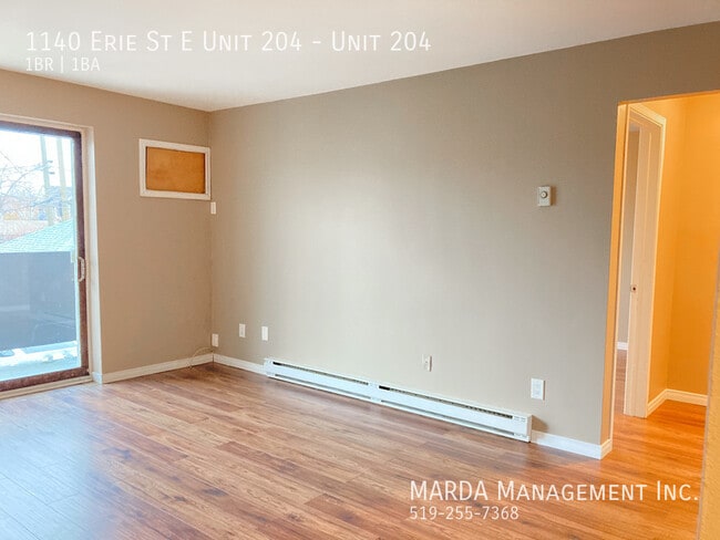 Building Photo - SPACIOUS 1 BEDROOM/1BATH UNIT WITH BALCONY...
