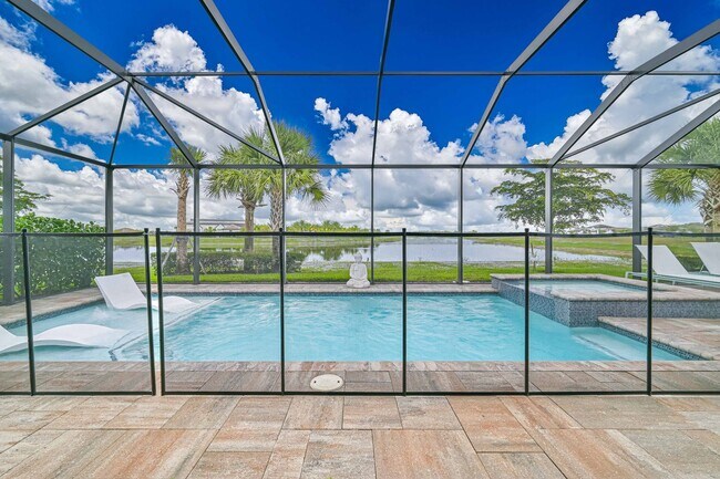 Foto del edificio - ** Single Family Home ~ Verdana Village ~ 3 Car Garage ~ Salt Water Pool & Lake Views **