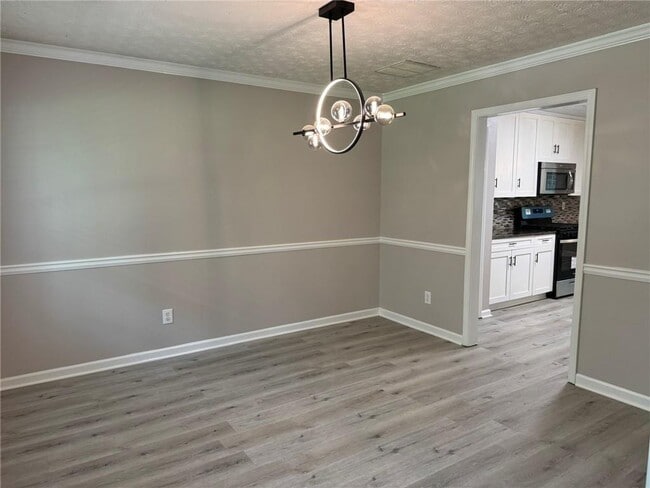 Building Photo - 7454 Woody Springs Dr