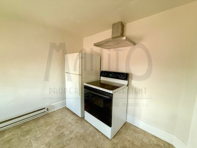 Building Photo - Garland Triplex