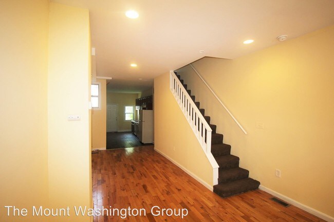 Building Photo - 305 S Stricker St