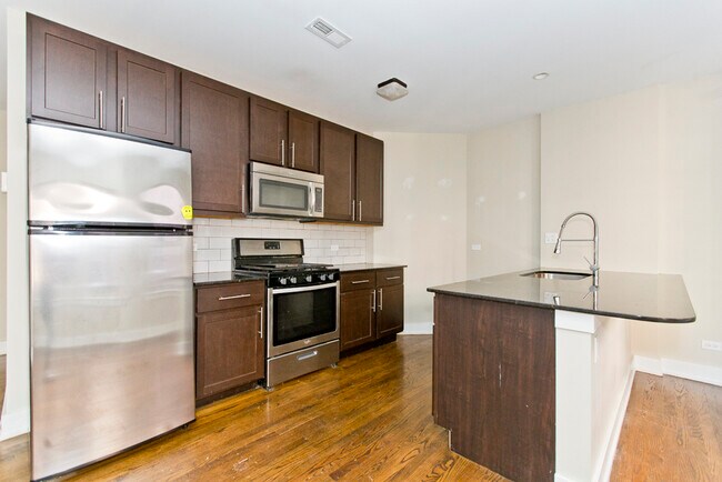 Building Photo - 5056 N Winchester Ave