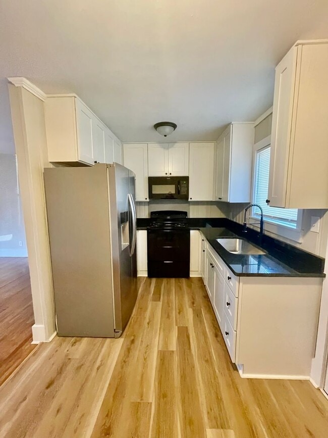 Building Photo - Welcome to Burgess2937, A Newly renovated charming 2-bedroom, 1-bathroom Duplex located in the vi...