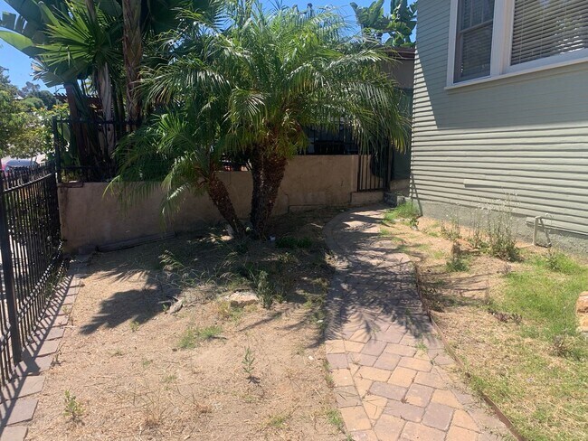 Building Photo - Fully gated Charming craftsman Two bedroom...