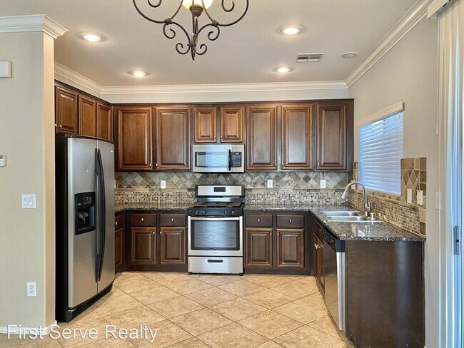 Building Photo - 4 br, 2.5 bath House - 6557 Cape Petrel St.