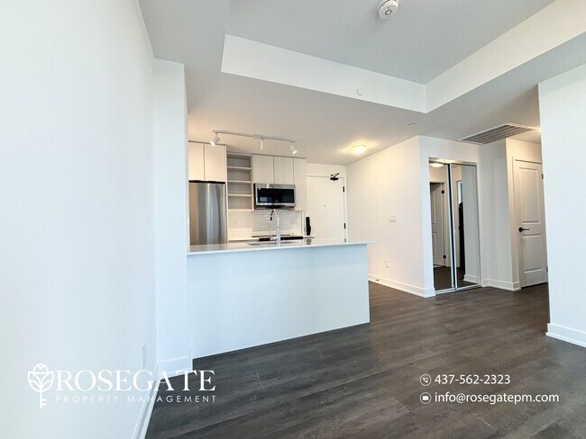 Building Photo - Modern 1-Bedroom Condo with Balcony, Parking & Locker – Burlington