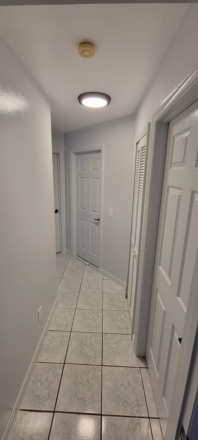 Hall to 3 rooms and 2nd bath - 141 SE 45th St