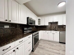 Building Photo - 6039 Collins Ave
