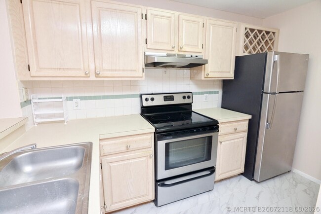 Building Photo - 1845 Palm Cove Blvd