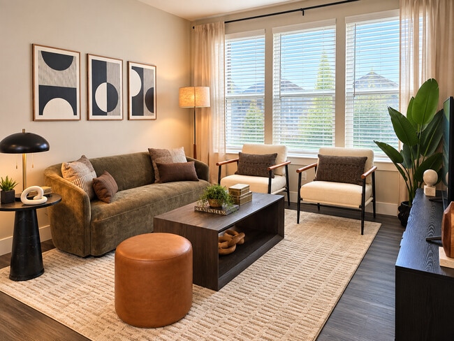 Living Room features lots of natural light - Icon Apartment Homes at Lovell Road