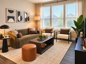 Living Room features lots of natural light - Icon Apartment Homes at Lovell Road