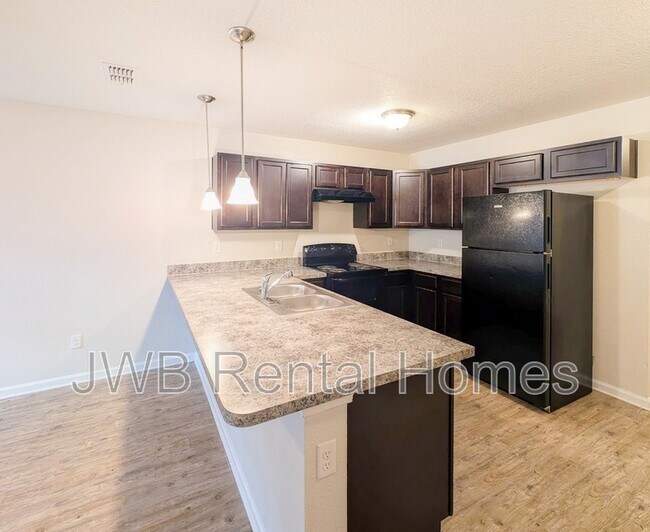 Building Photo - 8441 McGirts Village Ln