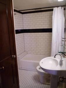 Bathroom with Subway tile. - 1605 St Paul St