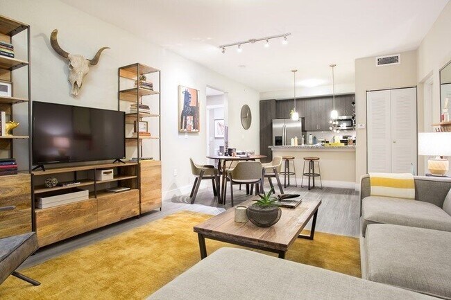 Sala de estar de un apartamento de una habitación - Shalimar at Davie